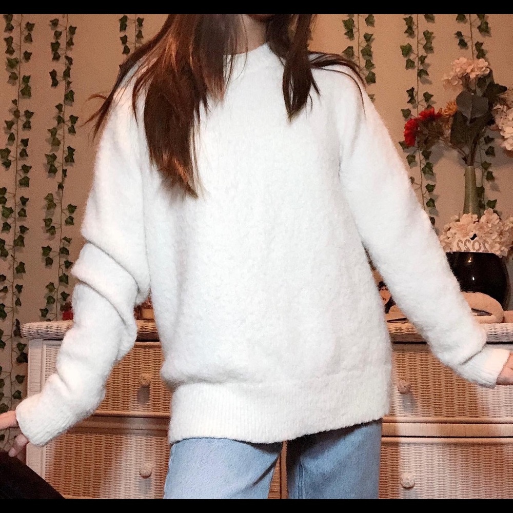Furry white sweater